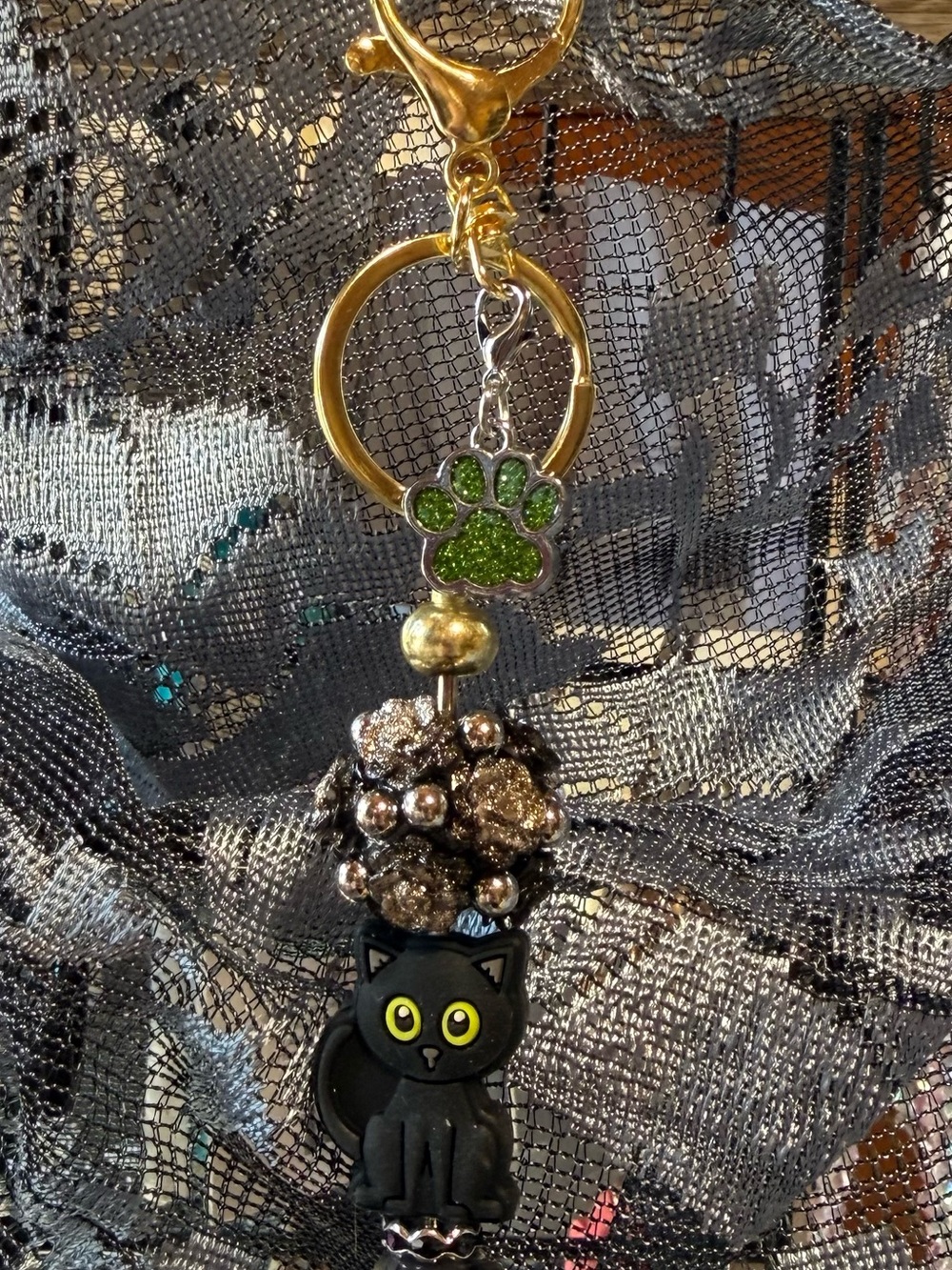 Gold Keyring with Green Paw Charm & Black Cat Accent